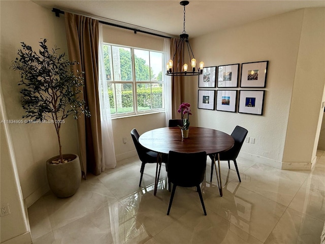 14902 SW 23rd Way, Miami, FL 33185 - dining room with a chandelier and light marble finish floors