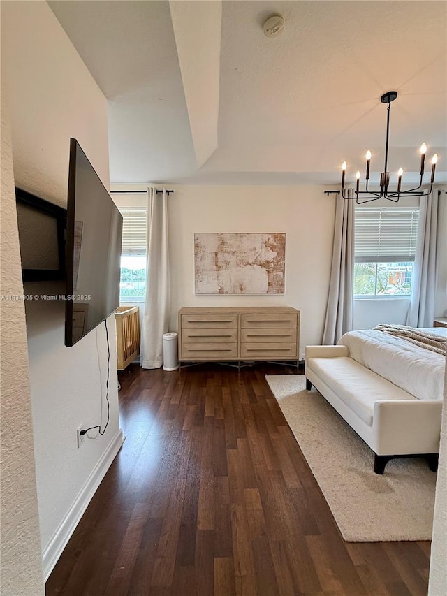 14902 SW 23rd Way, Miami, FL 33185 - sitting room featuring a chandelier, healthy amount of natural light, dark wood finished floors, and radiator