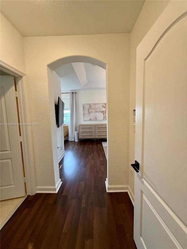 14902 SW 23rd Way, Miami, FL 33185 - hallway with wood finished floors and arched walkways