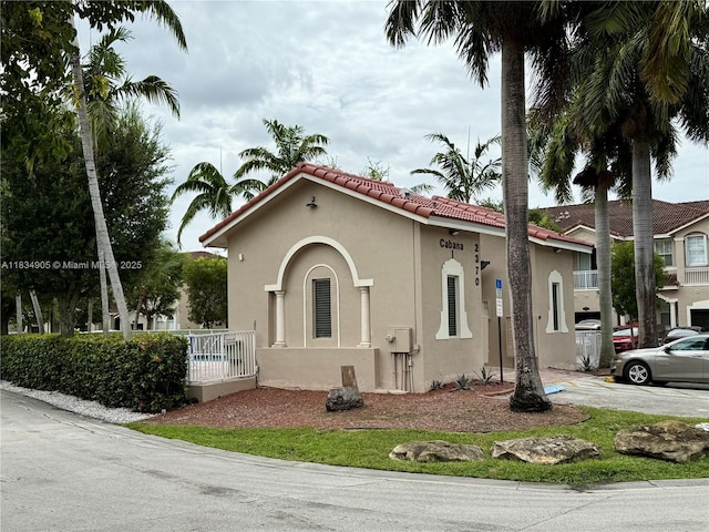14902 SW 23rd Way, Miami, FL 33185 - mediterranean / spanish-style home with stucco siding and a tiled roof