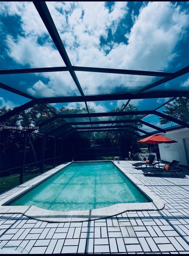 9260 SW 176th St, Palmetto Bay, FL 33157 - swimming pool featuring a patio area and a lanai
