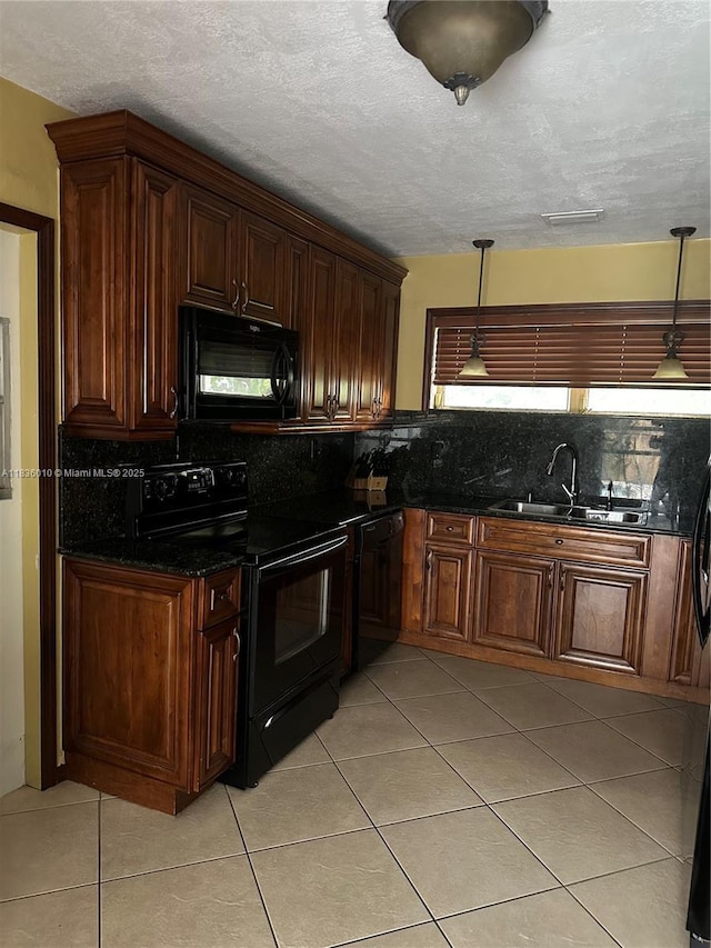 9260 SW 176th St, Palmetto Bay, FL 33157 - kitchen featuring black appliances, decorative backsplash, light tile patterned floors, pendant lighting, and a textured ceiling