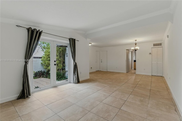 11245 SW 65th St, Miami, FL 33173 - empty room with a chandelier, light tile patterned floors, ornamental molding, french doors, and lofted ceiling