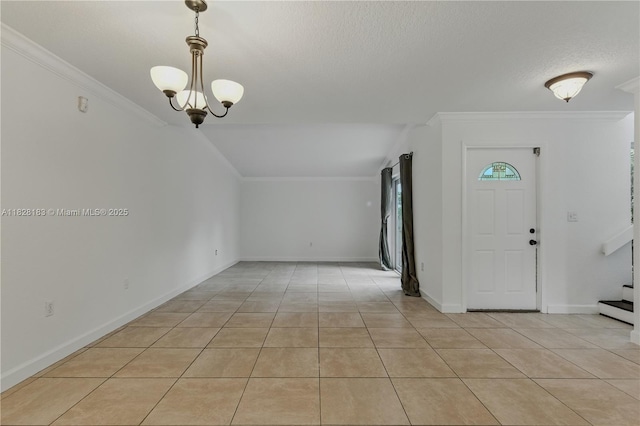 11245 SW 65th St, Miami, FL 33173 - foyer entrance with crown molding, light tile patterned flooring, a textured ceiling, and stairs