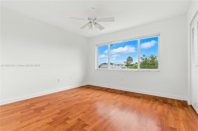 11245 SW 65th St, Miami, FL 33173 - unfurnished bedroom featuring light wood finished floors, ceiling fan, and a closet