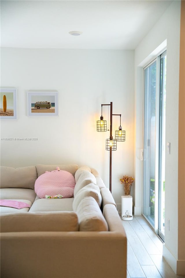 138 SW 171st Way, Pembroke Pines, FL 33027 - living room with light wood-style flooring