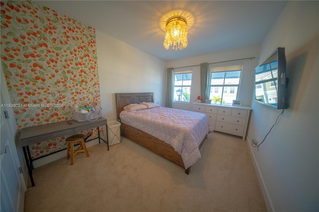 138 SW 171st Way, Pembroke Pines, FL 33027 - bedroom with light carpet and a chandelier