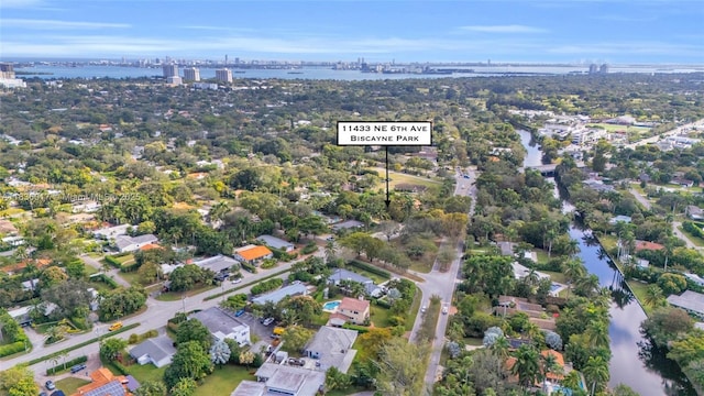 11433 NE 6th Ave, Biscayne Park, FL 33161 - aerial view of property and surrounding area with a nearby body of water and a notable bridge