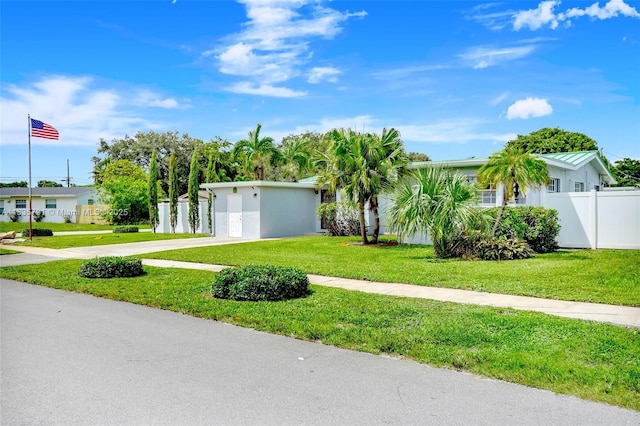 3511 Fairfax Dr, Fort Lauderdale, FL 33312 - view of front facade with concrete driveway and stucco siding