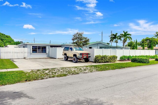 3511 Fairfax Dr, Fort Lauderdale, FL 33312 - rear view of house with stucco siding