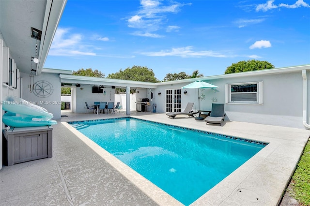 3511 Fairfax Dr, Fort Lauderdale, FL 33312 - swimming pool with a patio area and a grill