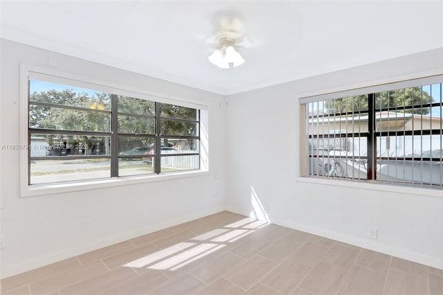 3511 Fairfax Dr, Fort Lauderdale, FL 33312 - spare room featuring healthy amount of natural light and ceiling fan