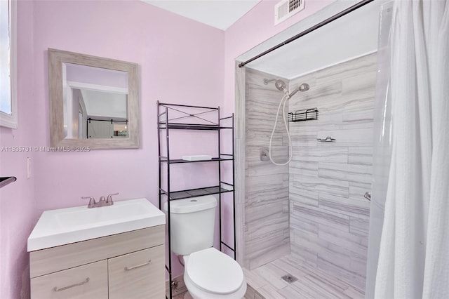3511 Fairfax Dr, Fort Lauderdale, FL 33312 - bathroom featuring vanity and a tile shower