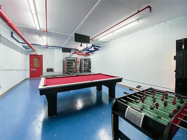 3400 NE 192nd St Unit 1403, Aventura, FL 33180 - rec room featuring pool table and concrete block wall