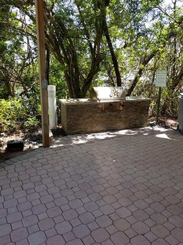 3400 NE 192nd St Unit 1403, Aventura, FL 33180 - view of patio / terrace featuring area for grilling