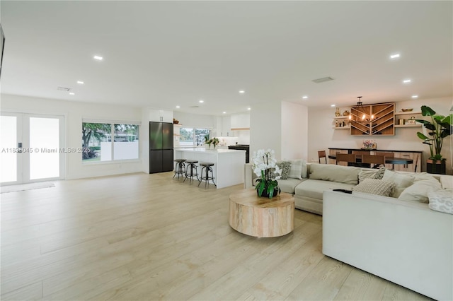 12241 SW 120th Ave, Miami, FL 33186 - living area with light wood finished floors and recessed lighting