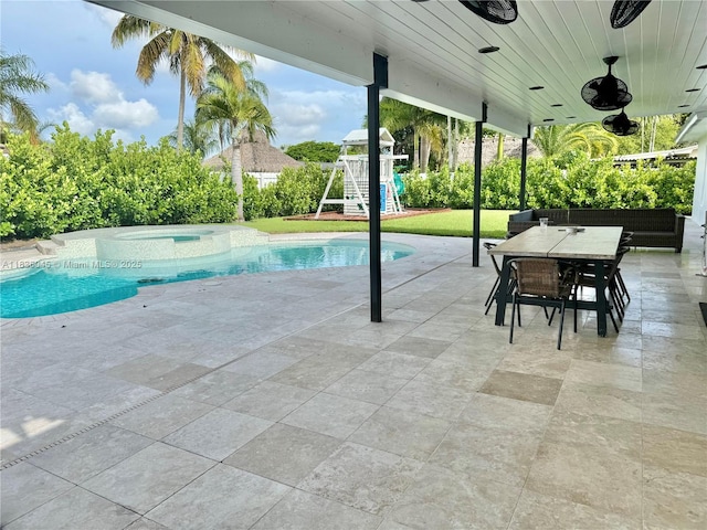 12241 SW 120th Ave, Miami, FL 33186 - outdoor pool with a patio area, outdoor dining space, and a ceiling fan
