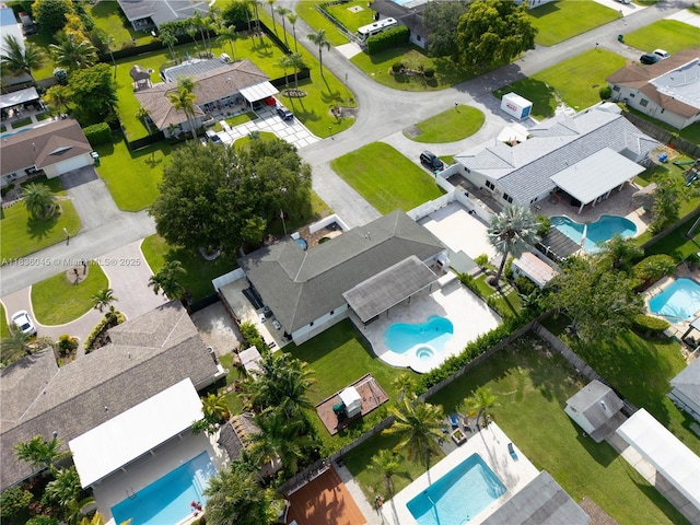 12241 SW 120th Ave, Miami, FL 33186 - aerial view of property and surrounding area with a pool area and nearby suburban area