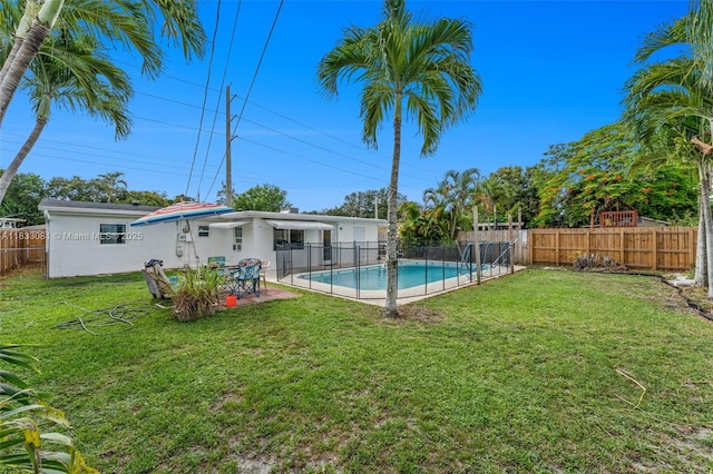3036 N 58th Ave, Hollywood, FL 33021 - view of swimming pool featuring a fenced backyard and a patio