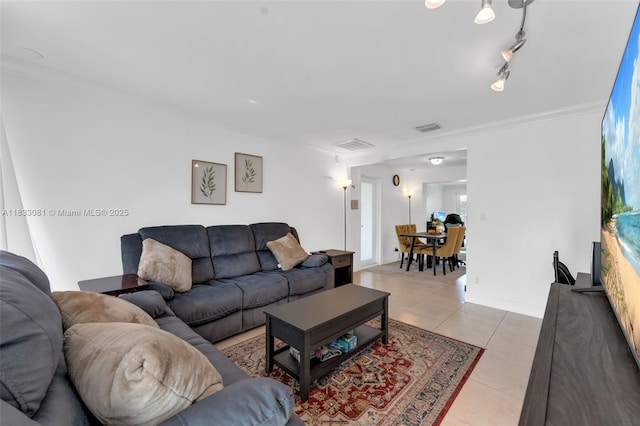 3036 N 58th Ave, Hollywood, FL 33021 - living area with light tile patterned flooring and crown molding