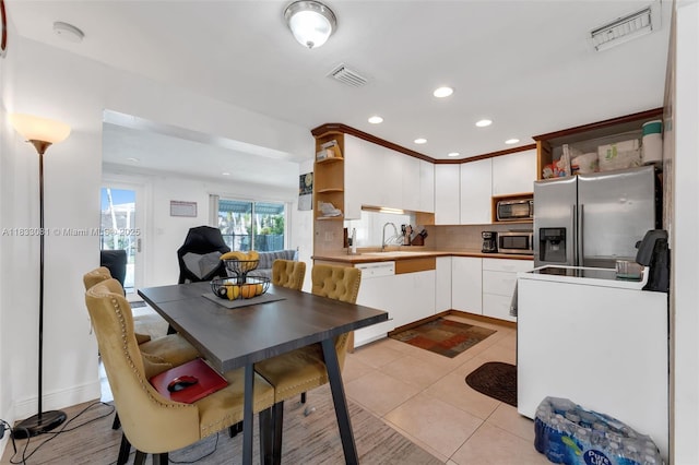 3036 N 58th Ave, Hollywood, FL 33021 - kitchen featuring open shelves, appliances with stainless steel finishes, tasteful backsplash, recessed lighting, and white cabinetry