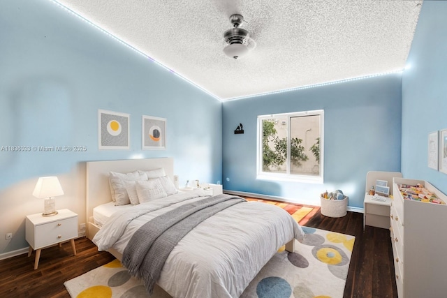 2472 SW 106th Ave, Miramar, FL 33025 - bedroom with lofted ceiling, wood finished floors, and a textured ceiling