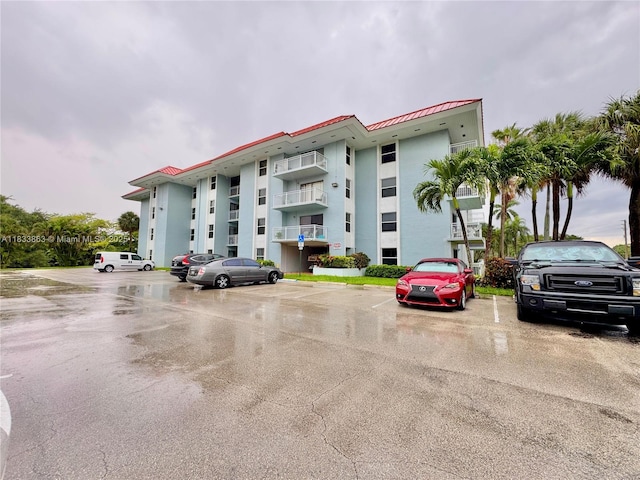 505 S Pine Island Rd Unit 407B, Plantation, FL 33324 - view of apartment building / complex featuring uncovered parking