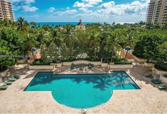 785 Crandon Blvd Unit 302, Key Biscayne, FL 33149 - community pool featuring a patio