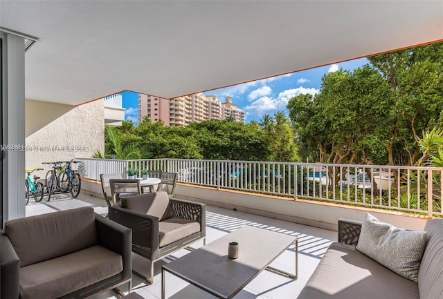785 Crandon Blvd Unit 302, Key Biscayne, FL 33149 - view of patio with an outdoor living space and outdoor dining area