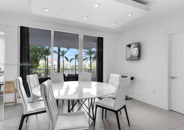 785 Crandon Blvd Unit 302, Key Biscayne, FL 33149 - dining room with light tile patterned flooring, a tray ceiling, and recessed lighting