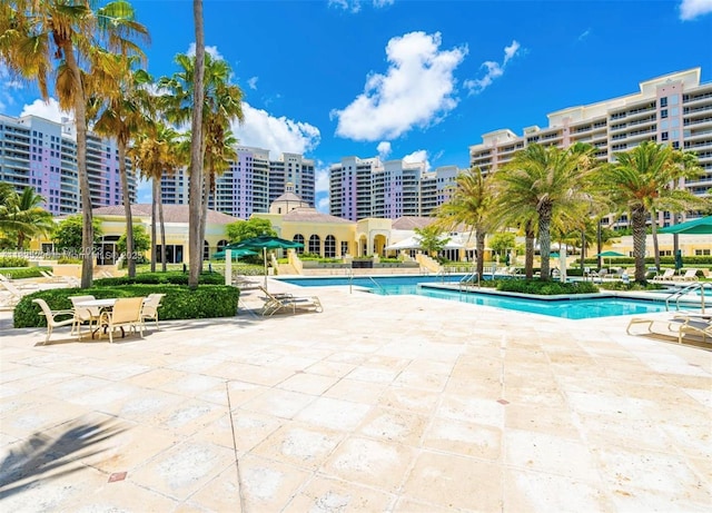 785 Crandon Blvd Unit 302, Key Biscayne, FL 33149 - community pool featuring a patio