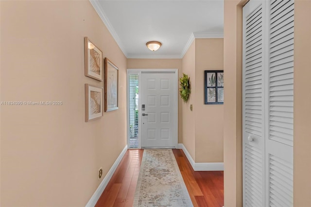 9614 NW 8th Cir, Plantation, FL 33324 - foyer entrance featuring wood finished floors and crown molding