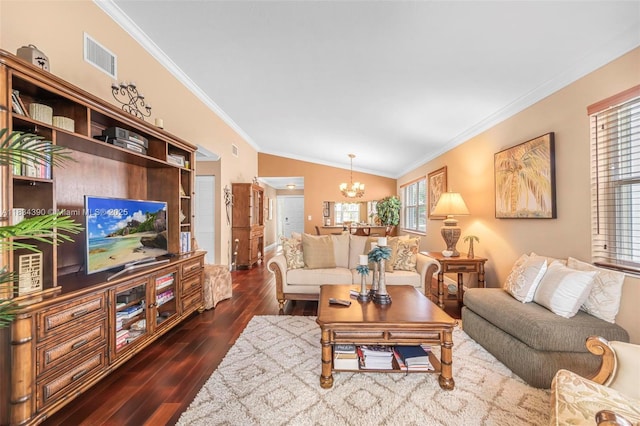 9614 NW 8th Cir, Plantation, FL 33324 - living area featuring a chandelier, ornamental molding, dark wood-type flooring, and vaulted ceiling