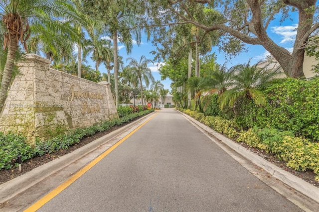 9614 NW 8th Cir, Plantation, FL 33324 - view of asphalt road featuring curbs