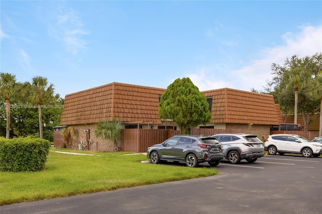 1170 SW 118th Ter, Davie, FL 33325 - view of property featuring uncovered parking