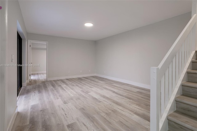 1170 SW 118th Ter, Davie, FL 33325 - spare room with wood finished floors and stairs