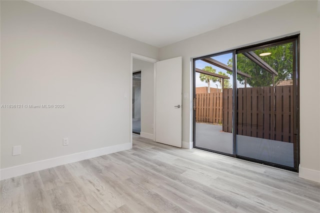 1170 SW 118th Ter, Davie, FL 33325 - empty room with light wood-style flooring