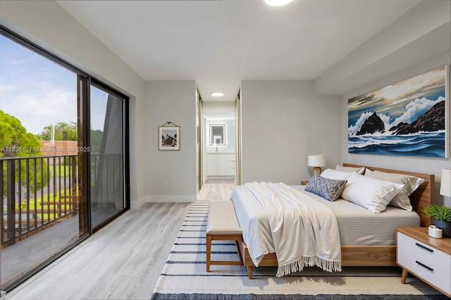 1170 SW 118th Ter, Davie, FL 33325 - bedroom with access to outside and light wood-style floors