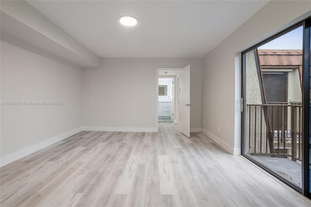 1170 SW 118th Ter, Davie, FL 33325 - spare room featuring wood finished floors and baseboards
