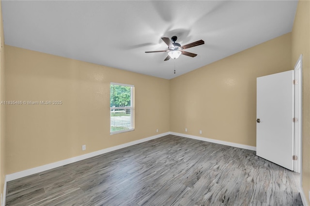 15859 N 68th Ct N, Loxahatchee, FL 33470 - empty room featuring a ceiling fan and wood finished floors