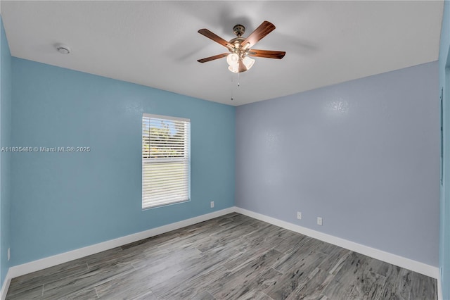 15859 N 68th Ct N, Loxahatchee, FL 33470 - unfurnished room with a ceiling fan, wood finished floors, and a smoke detector