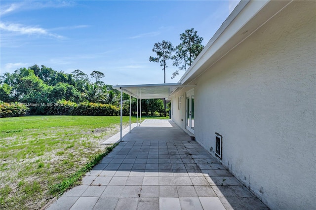 15859 N 68th Ct N, Loxahatchee, FL 33470 - view of patio / terrace featuring driveway