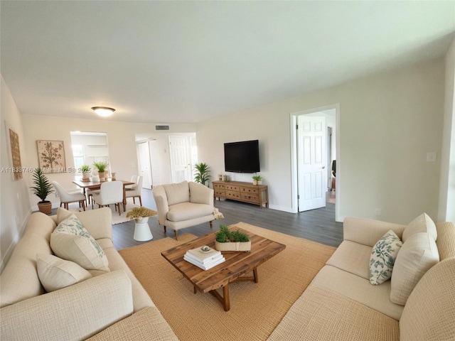 9750 Sunrise Lakes Blvd Unit 109, Sunrise, FL 33322 - living room with baseboards and dark wood-style floors