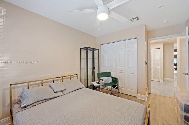 17476 SW 20th St, Miramar, FL 33029 - bedroom featuring light wood-style floors, a closet, and a ceiling fan
