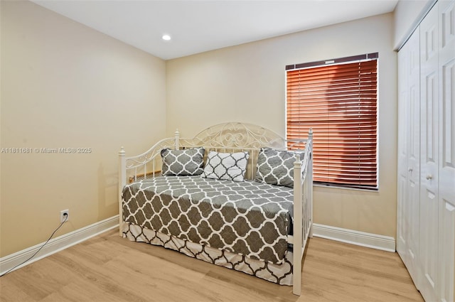 17476 SW 20th St, Miramar, FL 33029 - bedroom with a closet, wood finished floors, and recessed lighting