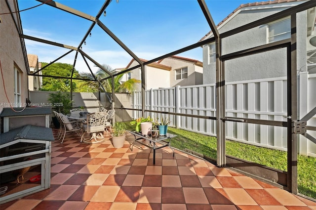 17476 SW 20th St, Miramar, FL 33029 - fenced backyard with a patio area, outdoor dining area, and a lanai