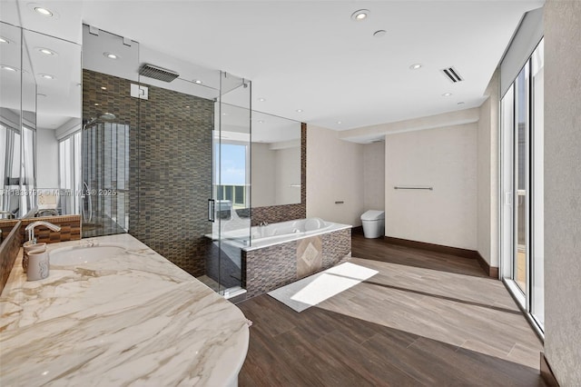 18201 Collins Ave Unit Ts2 & Ts3, Sunny Isles Beach, FL 33160 - full bath with a bath, vanity, a shower stall, recessed lighting, and wood finished floors