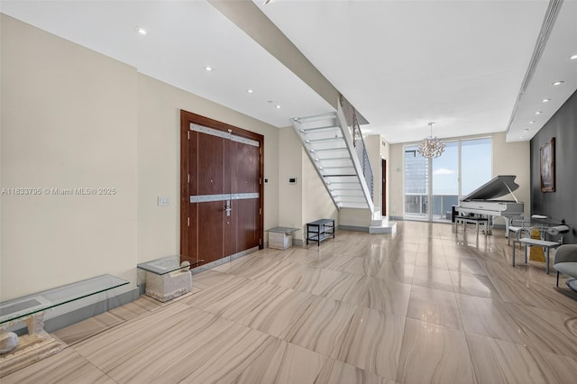 18201 Collins Ave Unit Ts2 & Ts3, Sunny Isles Beach, FL 33160 - foyer entrance featuring stairs, a chandelier, and recessed lighting
