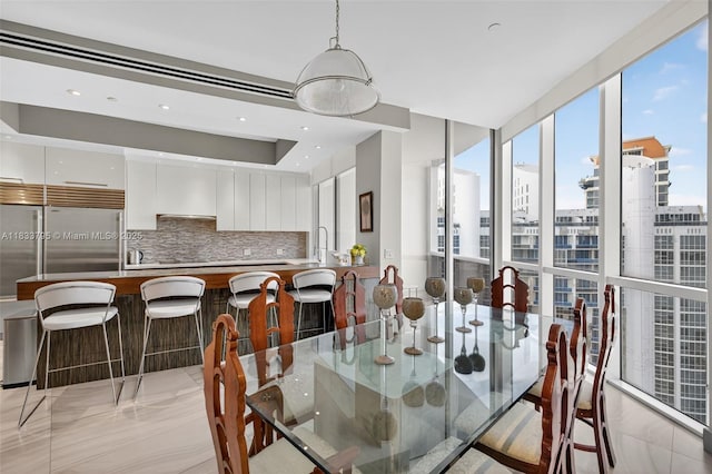 18201 Collins Ave Unit Ts2 & Ts3, Sunny Isles Beach, FL 33160 - dining space with expansive windows and a view of city