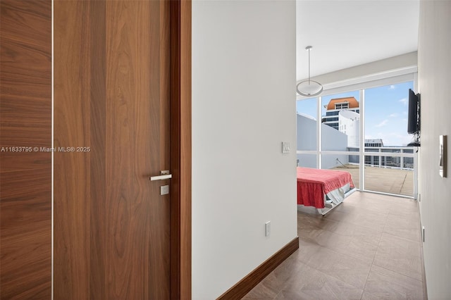 18201 Collins Ave Unit Ts2 & Ts3, Sunny Isles Beach, FL 33160 - hall with baseboards and tile patterned floors